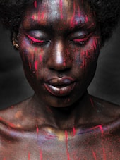 woman with red and black face paint