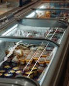 assorted food in silver commercial refrigerator