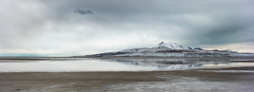 snow covered mountain during daytime