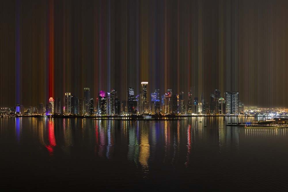 city skyline with lights turned on during night time