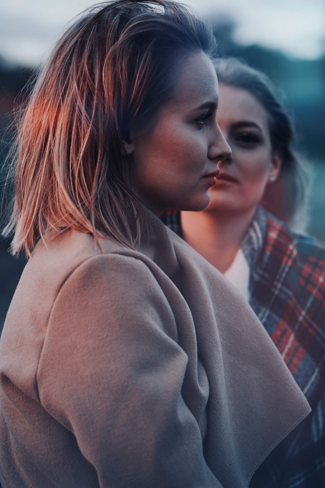 woman in red and black plaid shirt