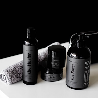 3 bottles on white table