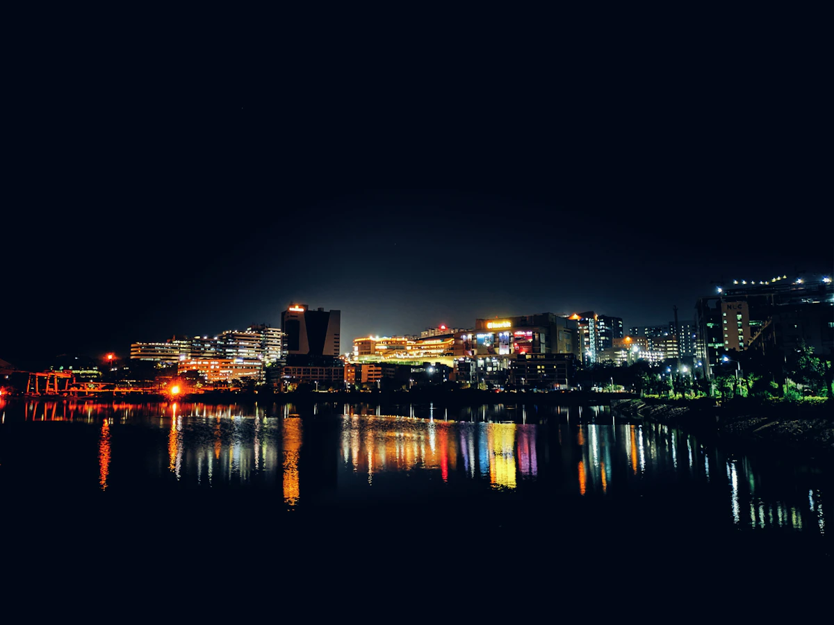 Hyderabad skyline at night across Durgam Cheruvu