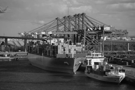 grayscale photo of cargo ship