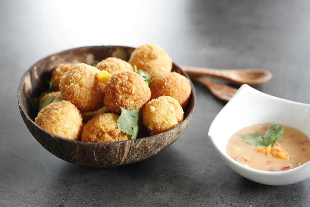 fried food on brown ceramic bowl