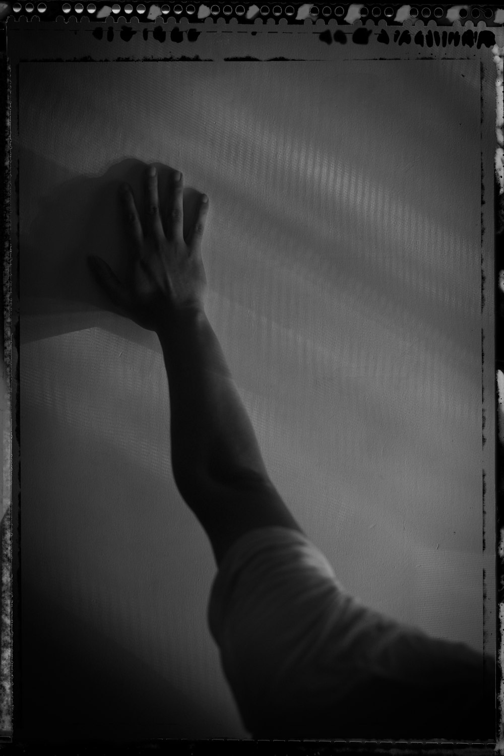 grayscale photo of persons left hand