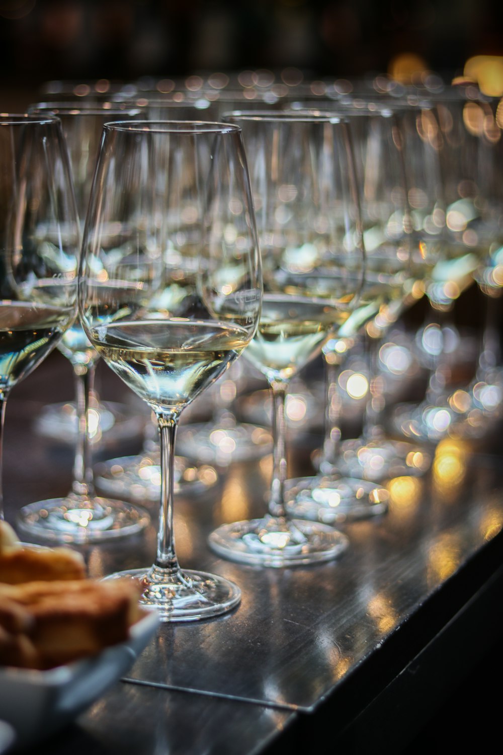 clear wine glass on brown wooden table