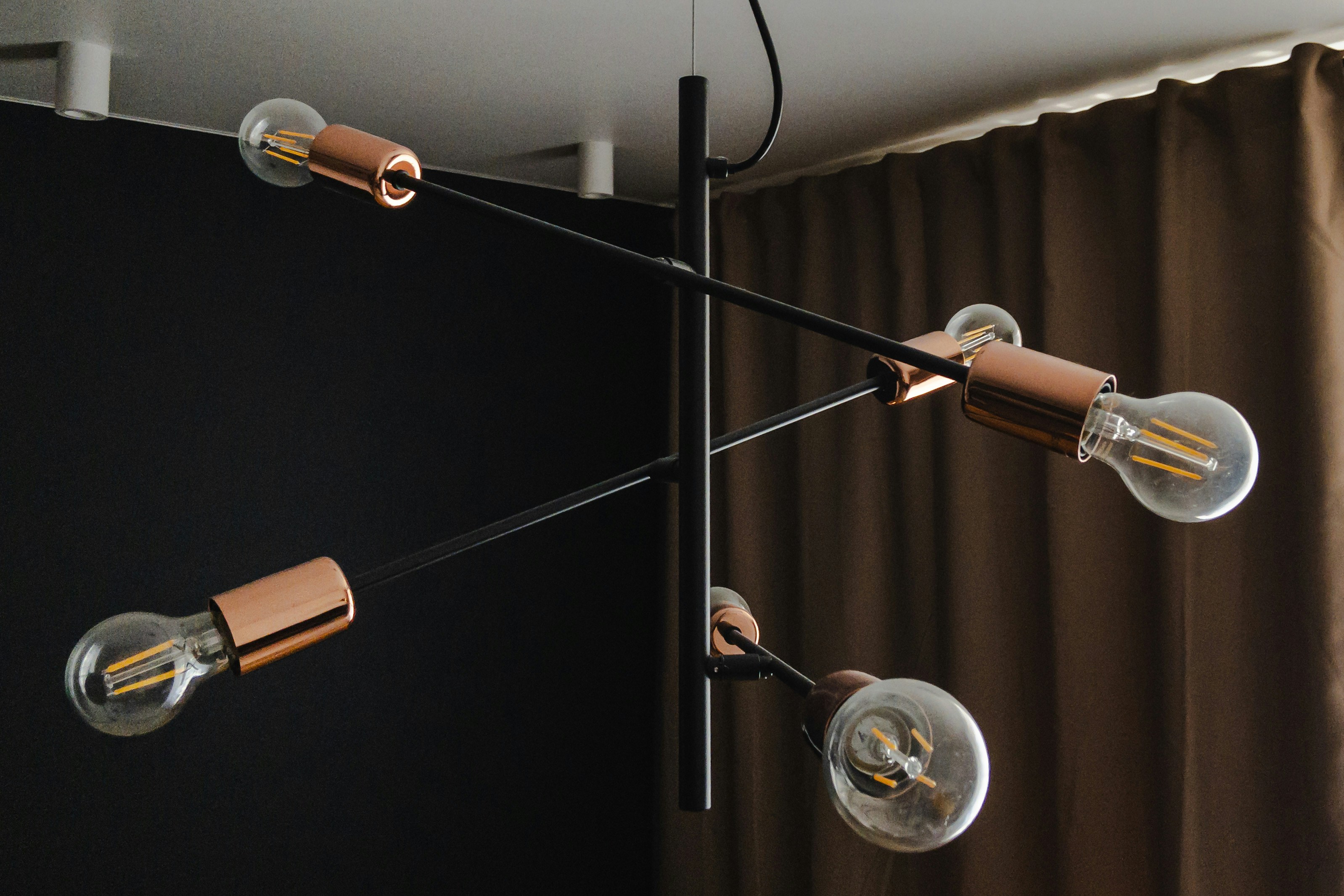 silver and brown pendant lamp