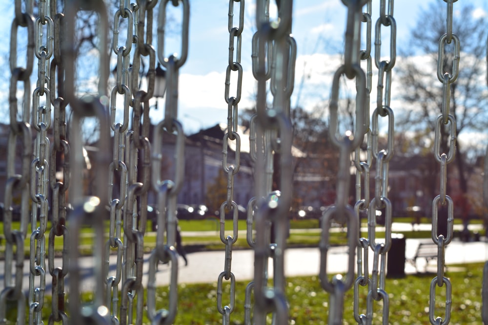silver chain link fence with water droplets