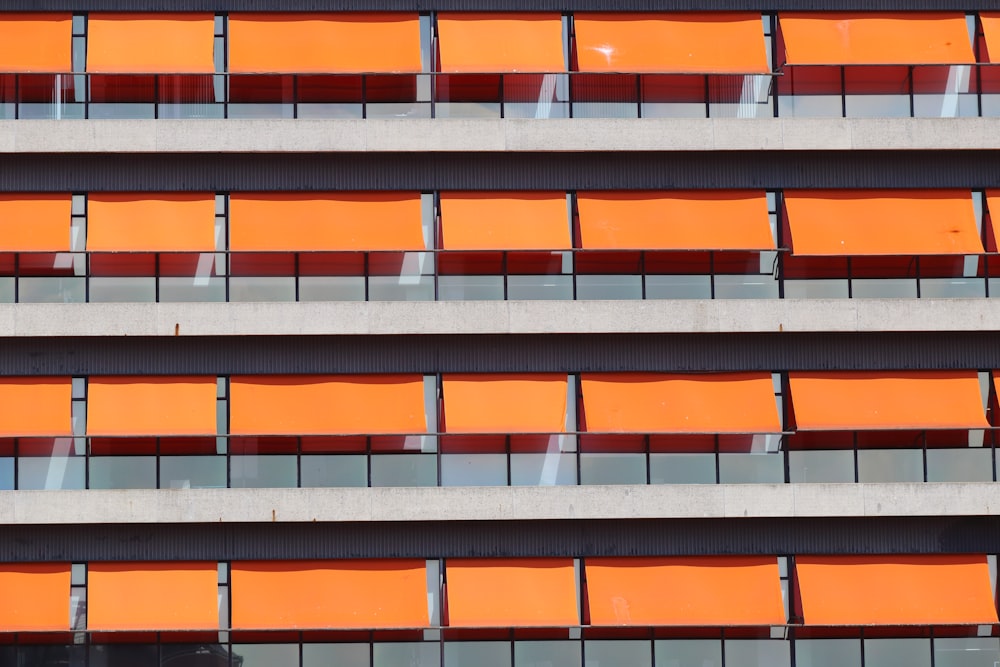 a close up of a building with orange windows