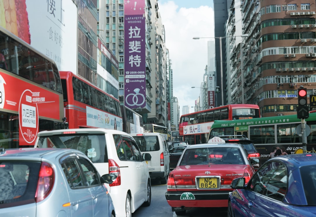 cars on road near buildings during daytime