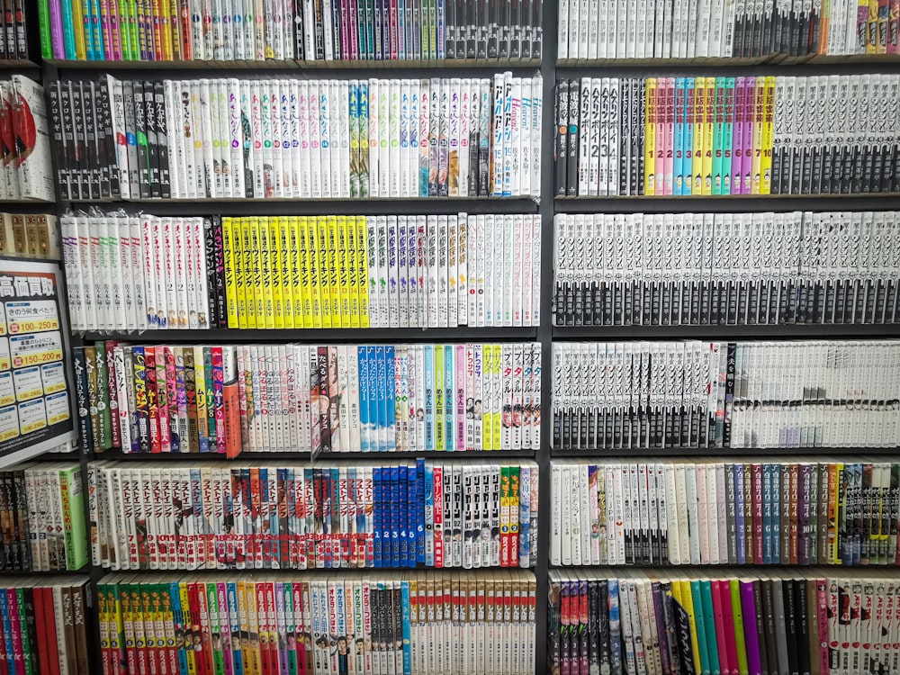 books on black wooden shelf