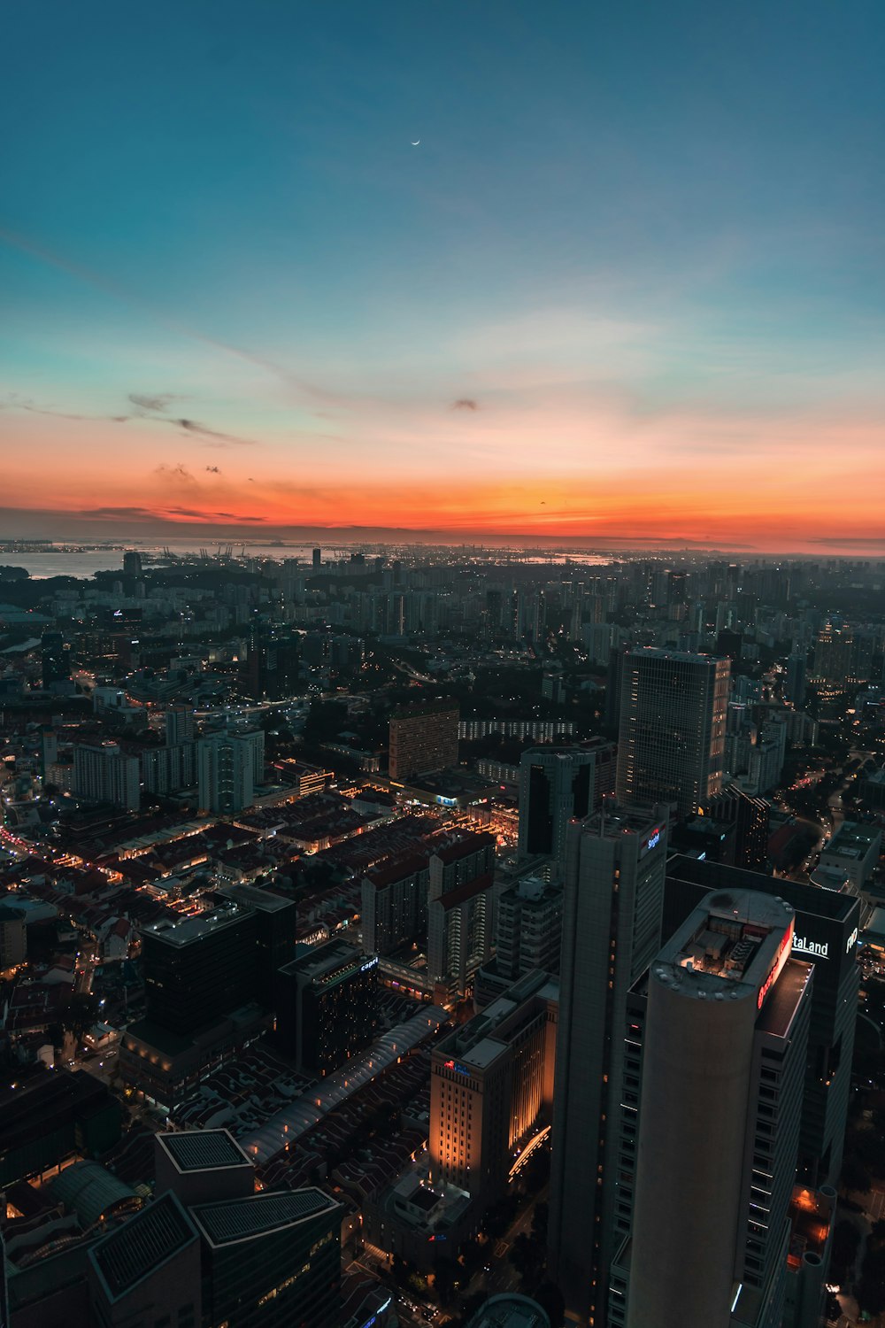 aerial view of city buildings during sunset