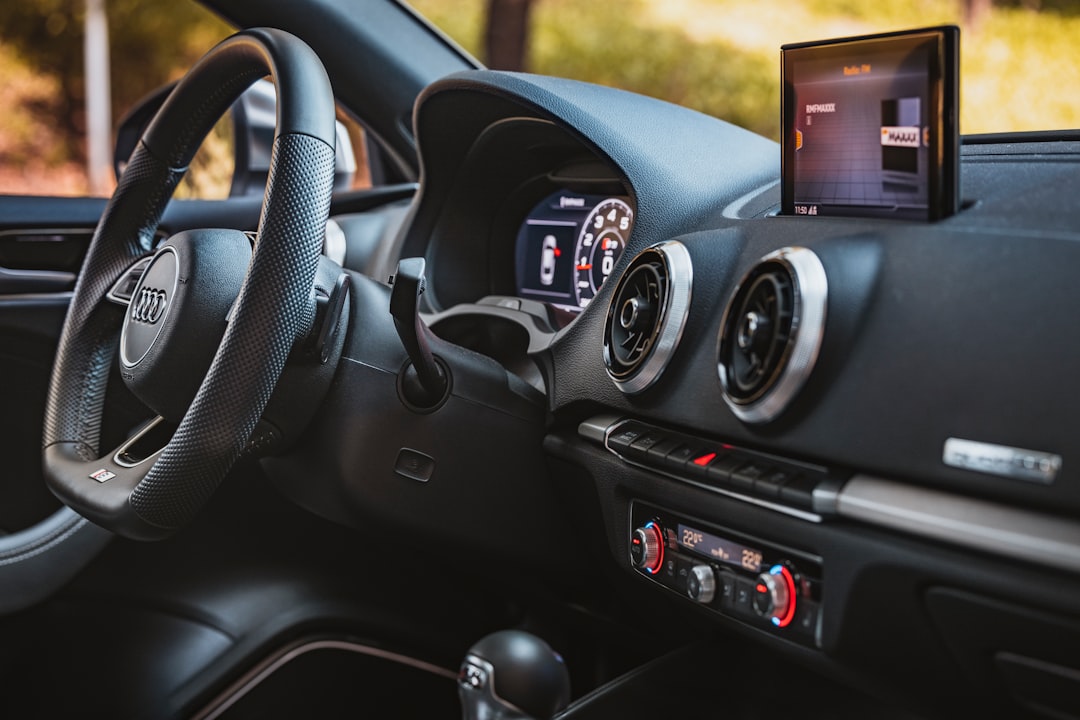 black and gray car steering wheel