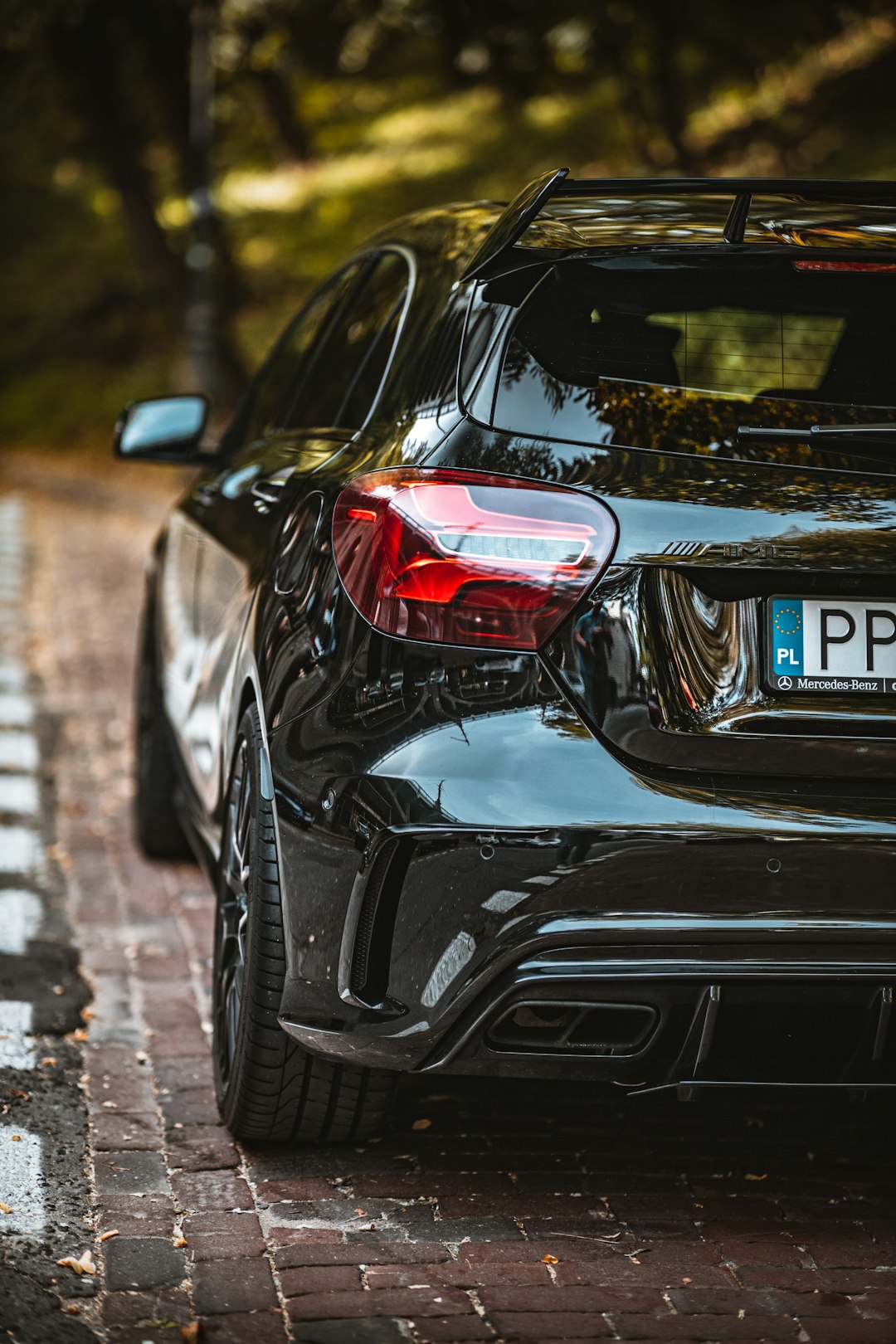 black car on road during daytime