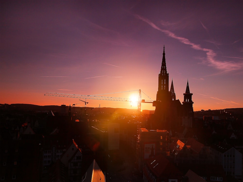 silhouette of buildings during sunset