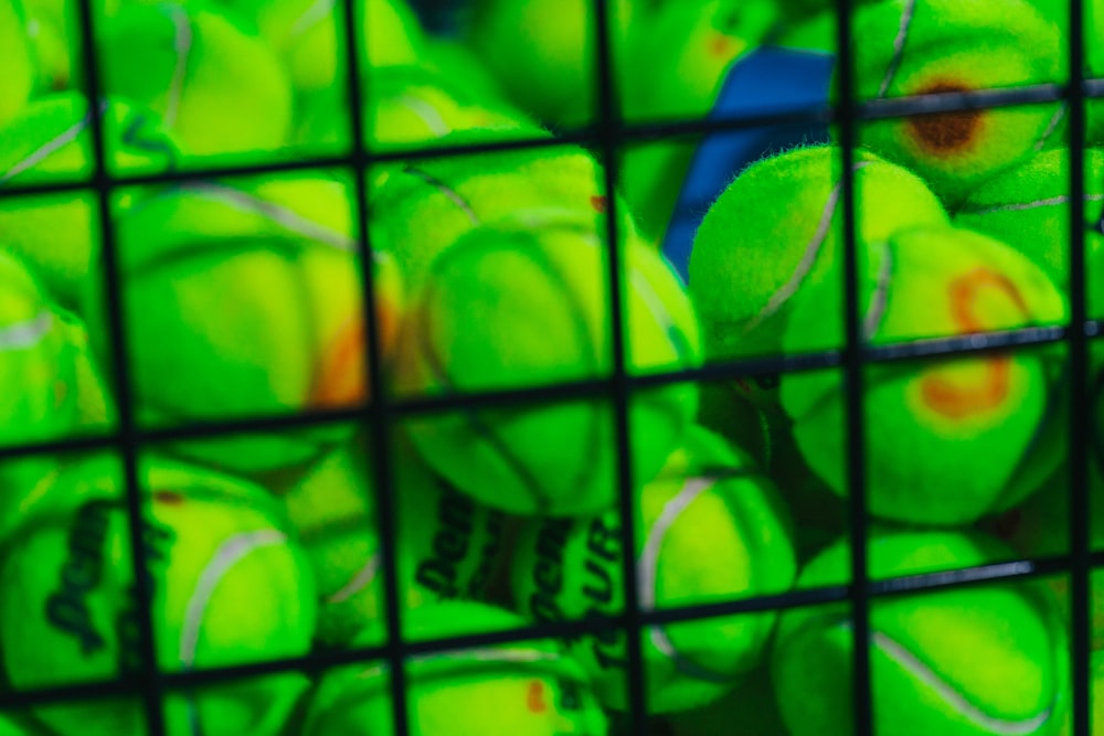 green and black tennis balls