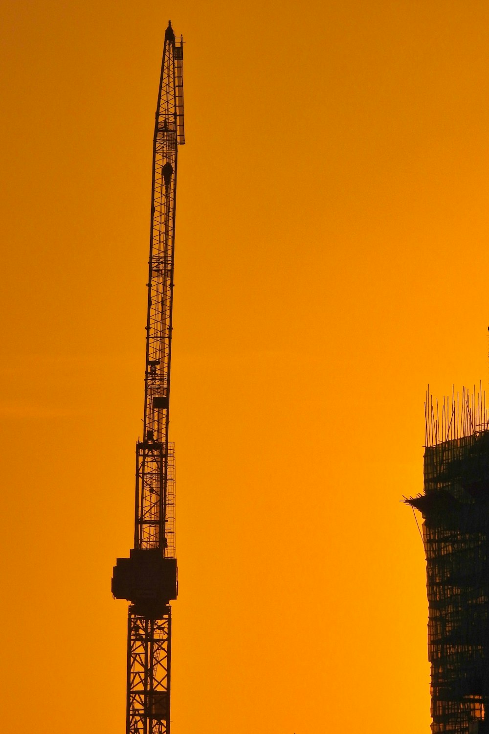 silhouette of tower during sunset