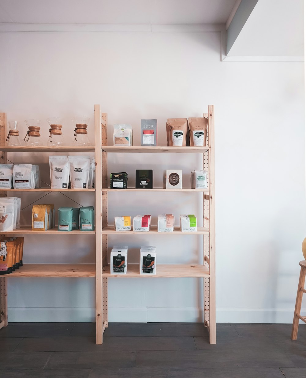 brown wooden shelf with bottles