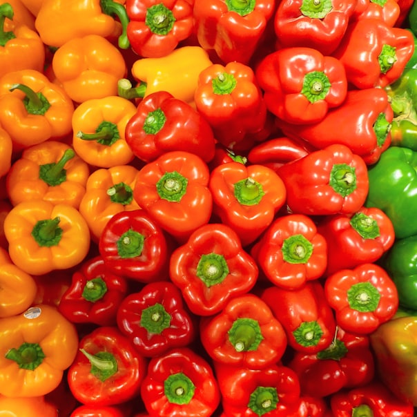 orange bell peppers on white ceramic plate