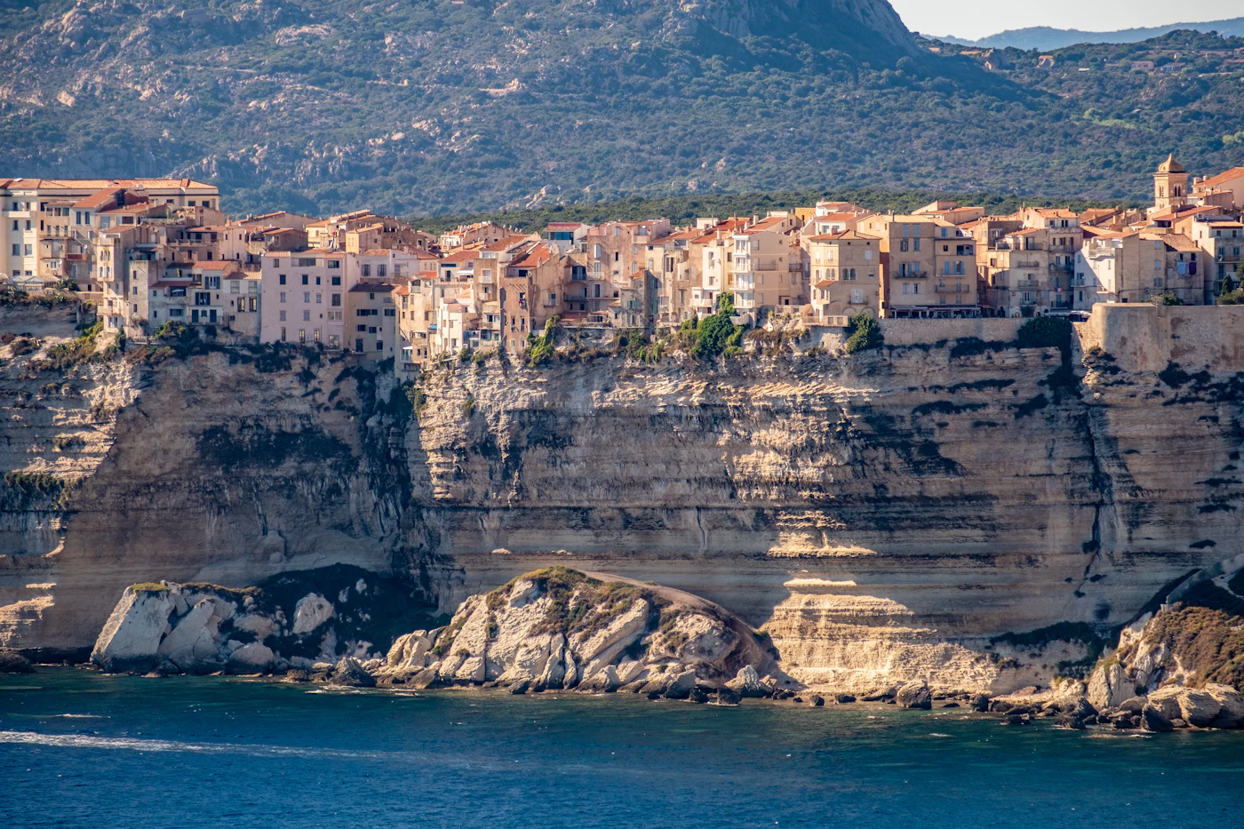 Old town houses perched on the white sea cliffs of Bonifacio, Corsica
