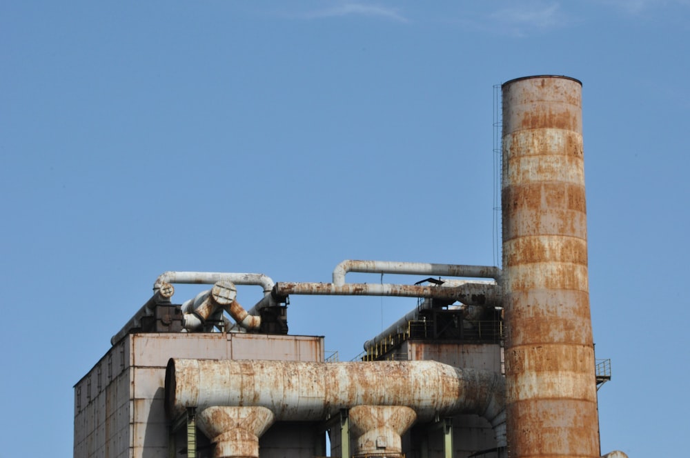 brown and gray concrete water pipe