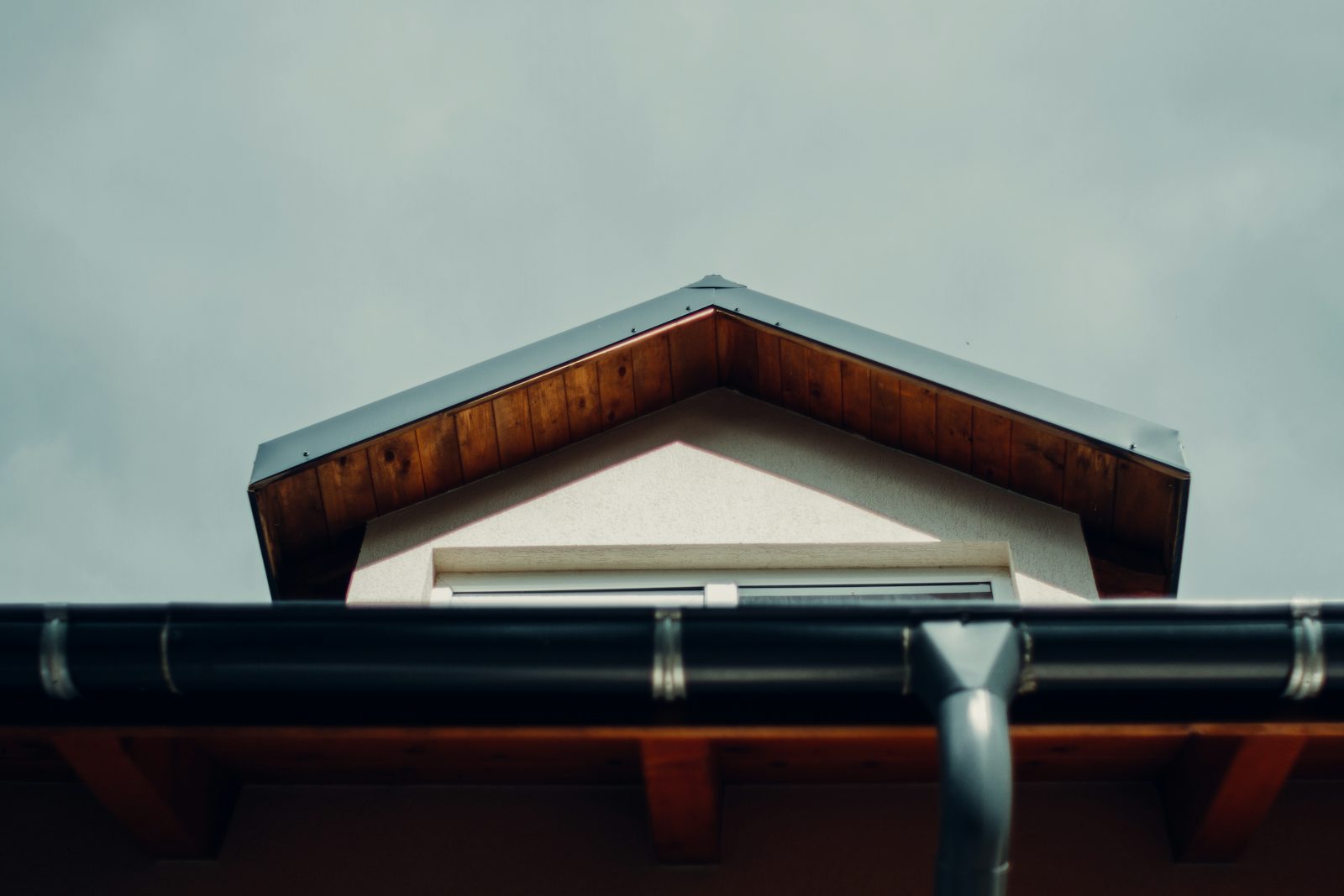 Rain gutter along the eaves of a house