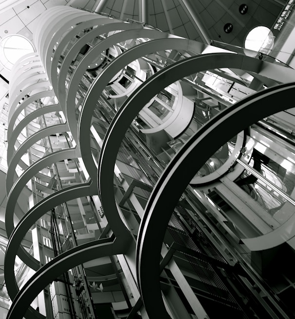 white metal spiral staircase inside building