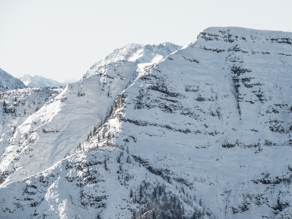 snow covered mountain during daytime