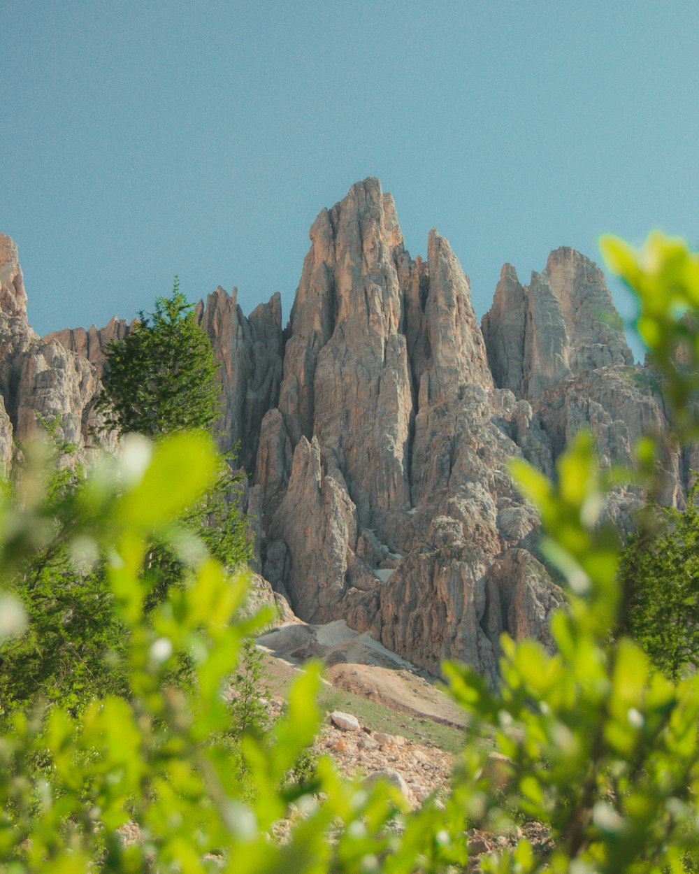 brown rocky mountain under blue sky during daytime