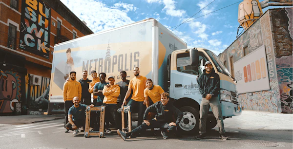 Man and van — team of movers beside white van