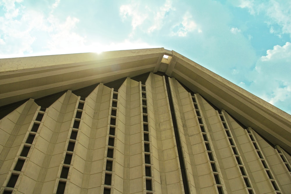 white concrete building under blue sky during daytime