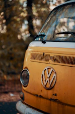 Close-up of a VW T5 camper’s weathered exterior showing dents and scratches that tell stories.
