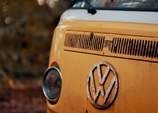 yellow volkswagen t-2 van