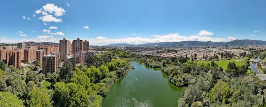 aerial view of city buildings and river during daytime in Humedal de Córdoba Colombia
