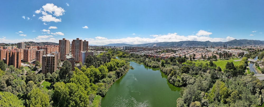 aerial view of city buildings and river during daytime