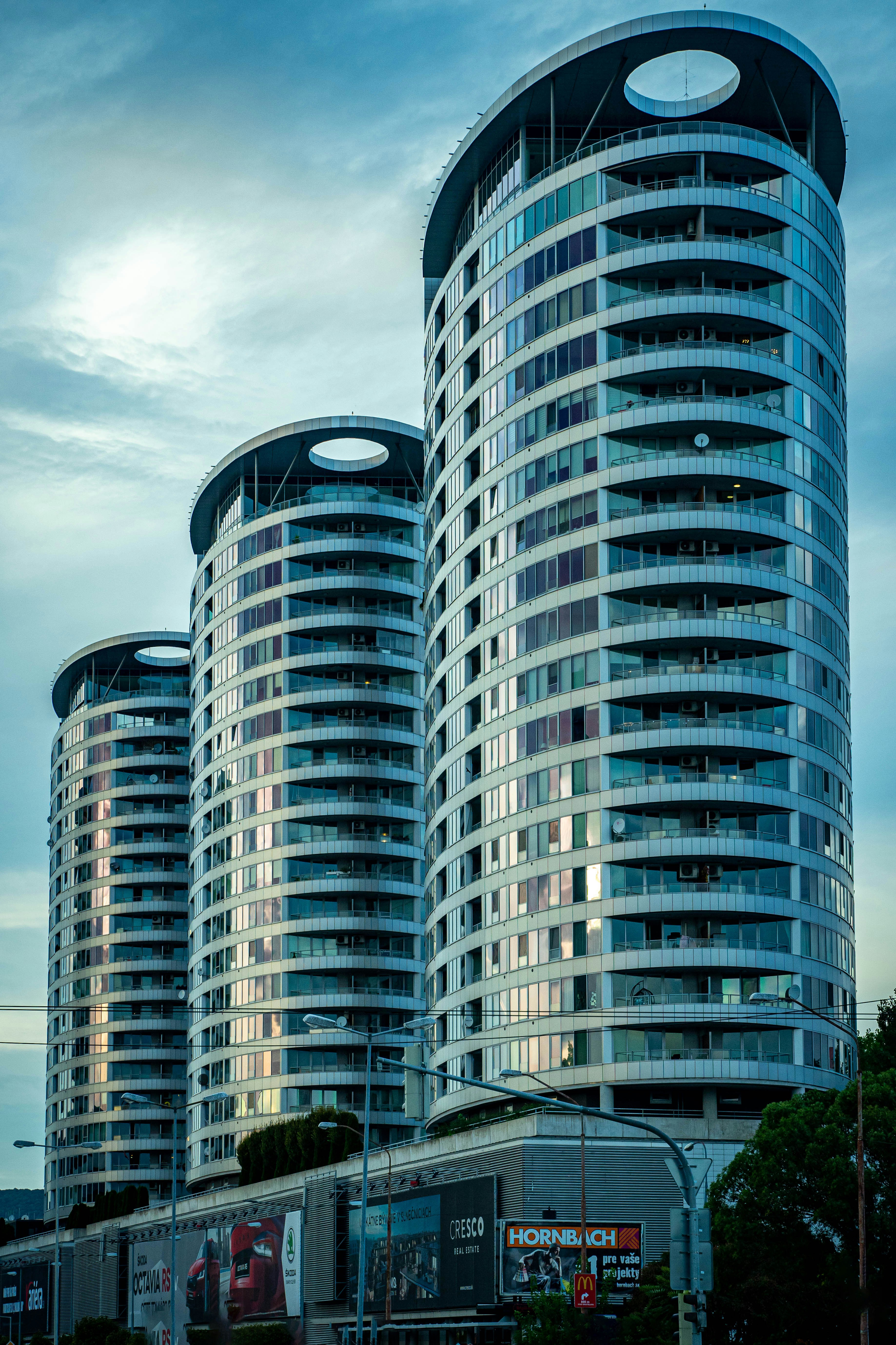white and blue high rise building under blue sky