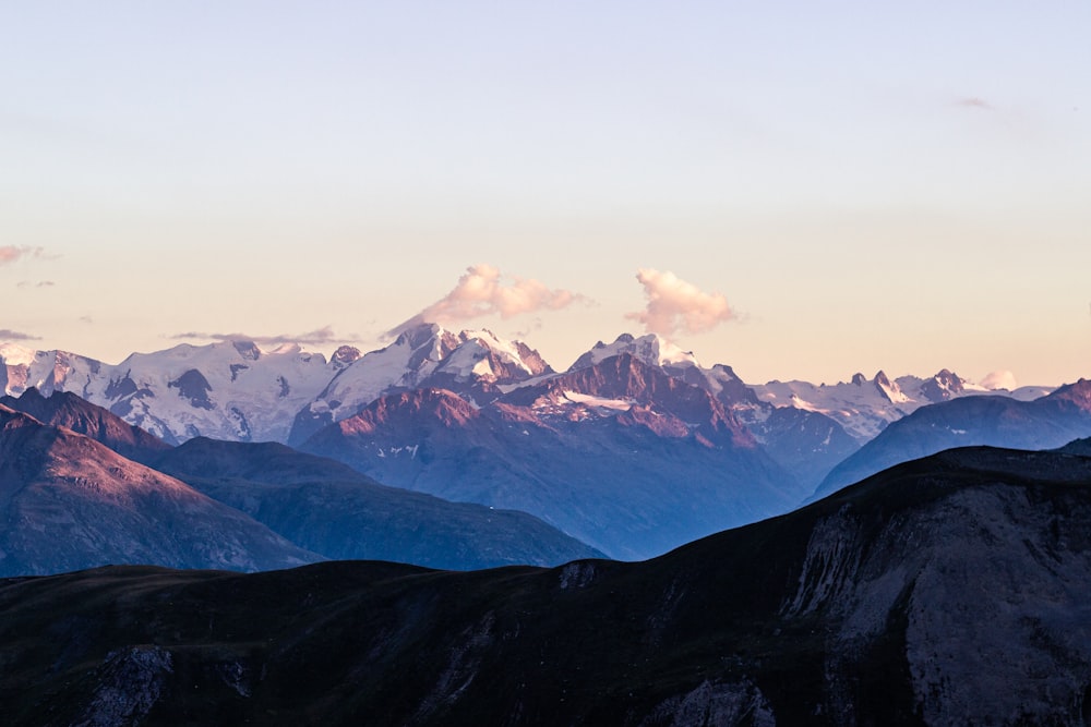 snow covered mountains during daytime