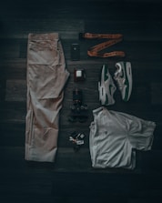 gray pants on black table