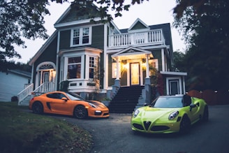 yellow lamborghini aventador parked in front of white and gray house