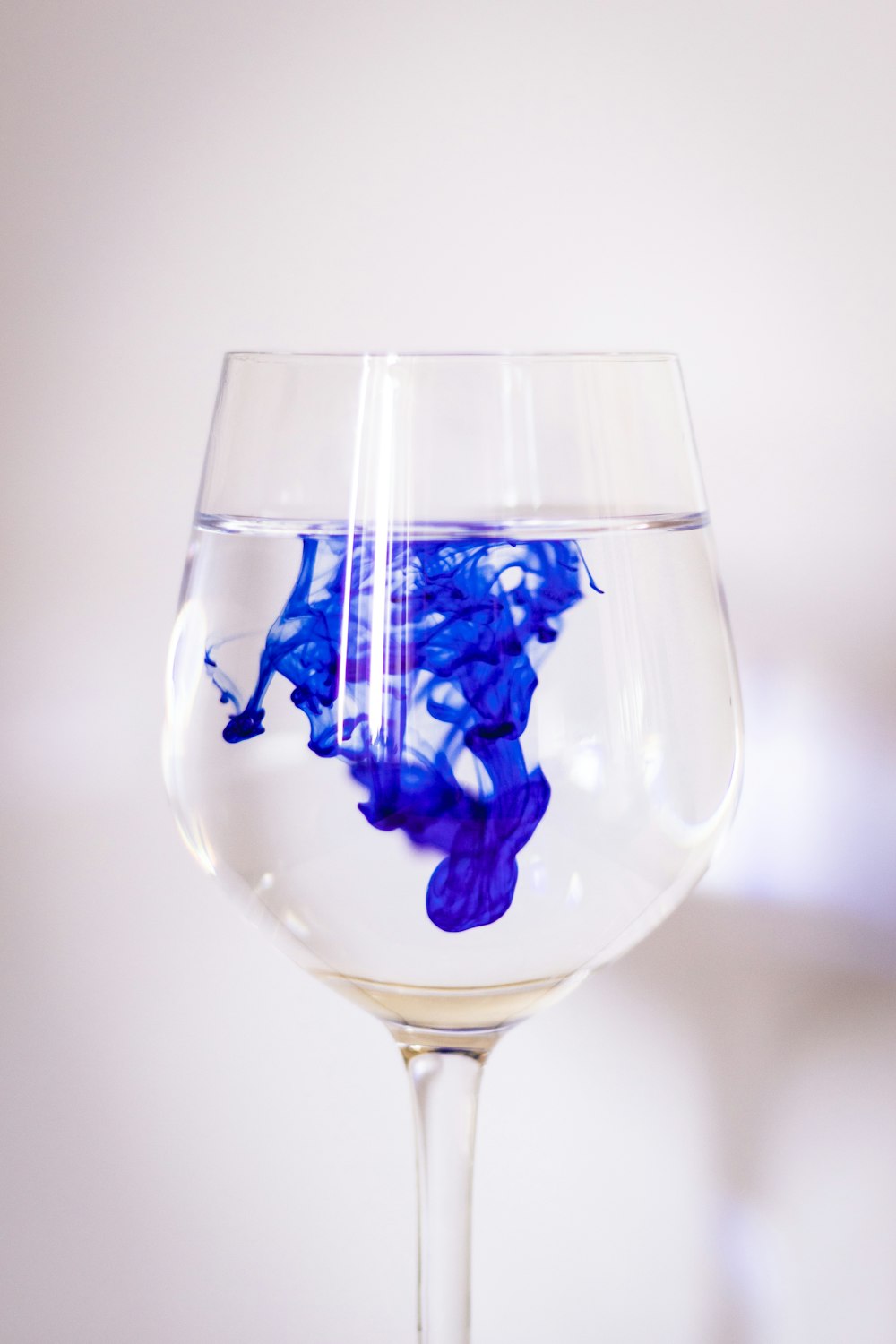 blue and white wine glass