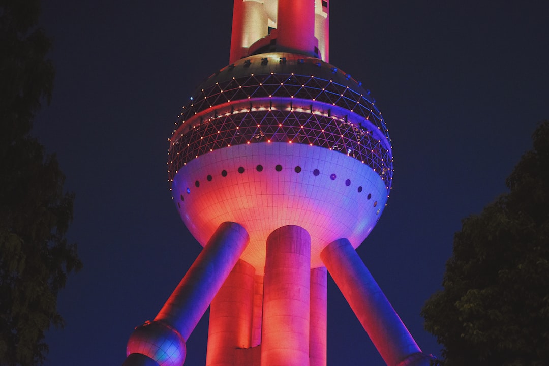 blue and white tower with lights