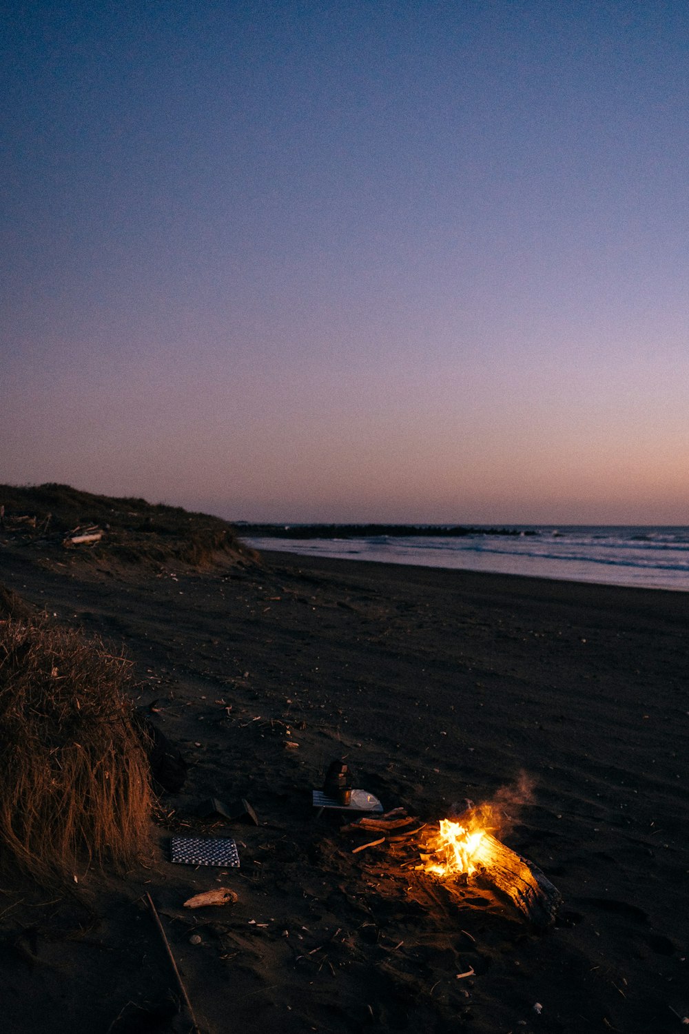 bonfire on beach shore during daytime