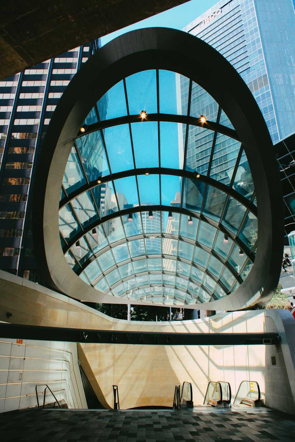 people walking on gray concrete building