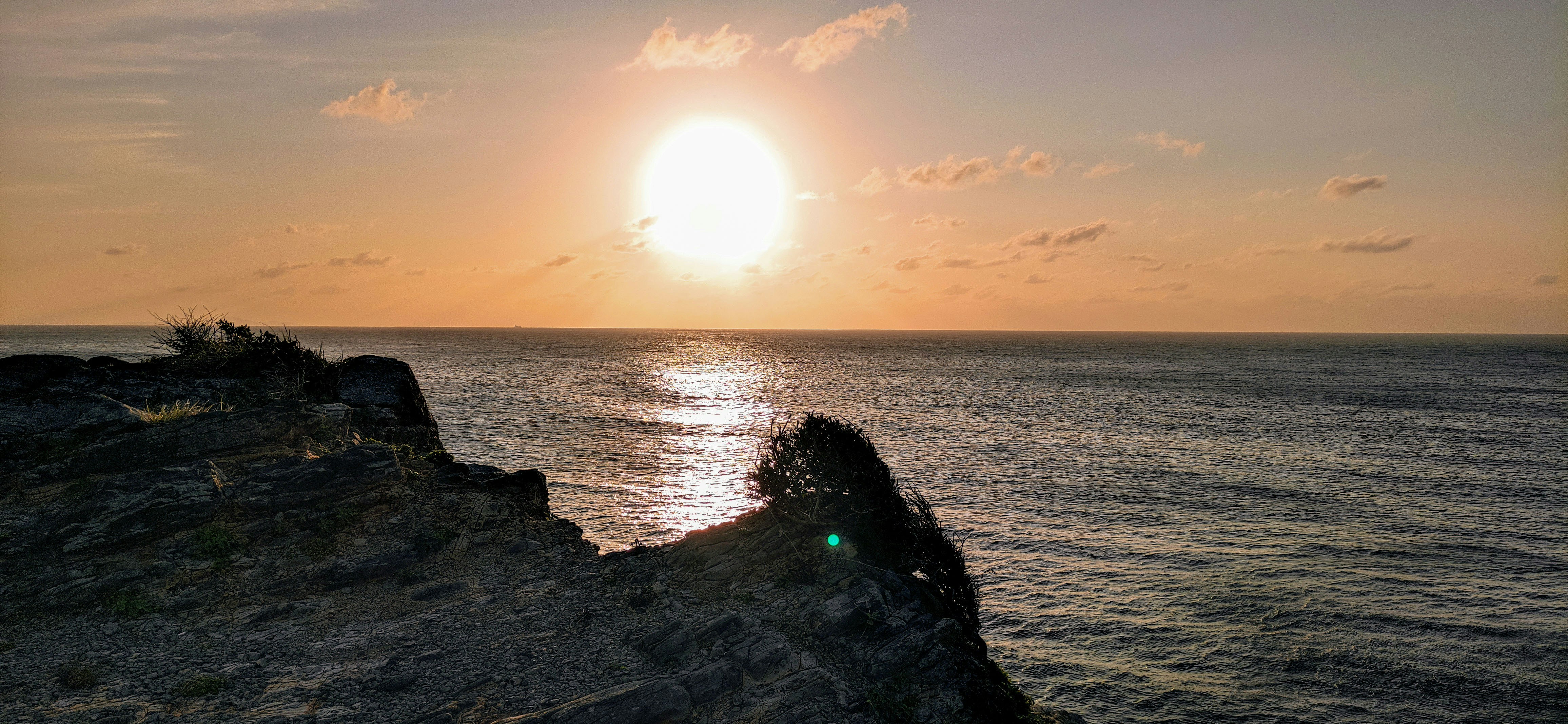 silhouette of person on beach during sunset