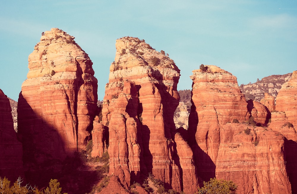 brown rock formation under blue sky during daytime