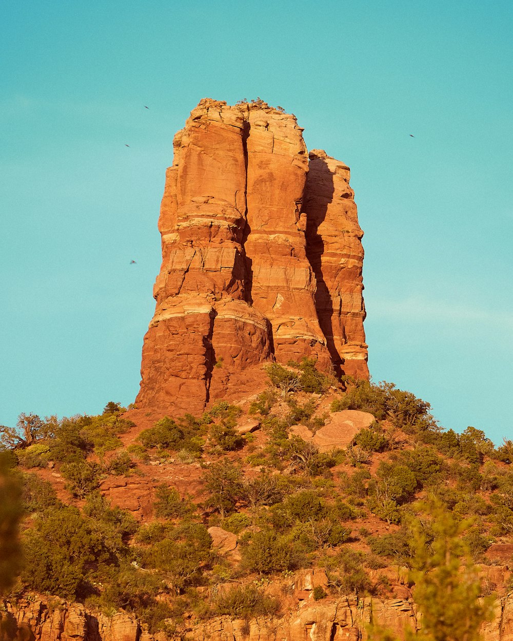 brown rock formation under blue sky during daytime