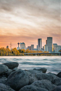 city skyline across body of water during daytime