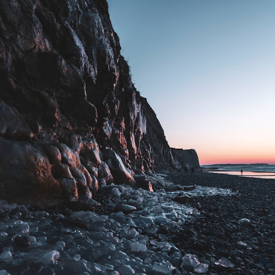 brown rock formation near body of water during daytime in Escalles France