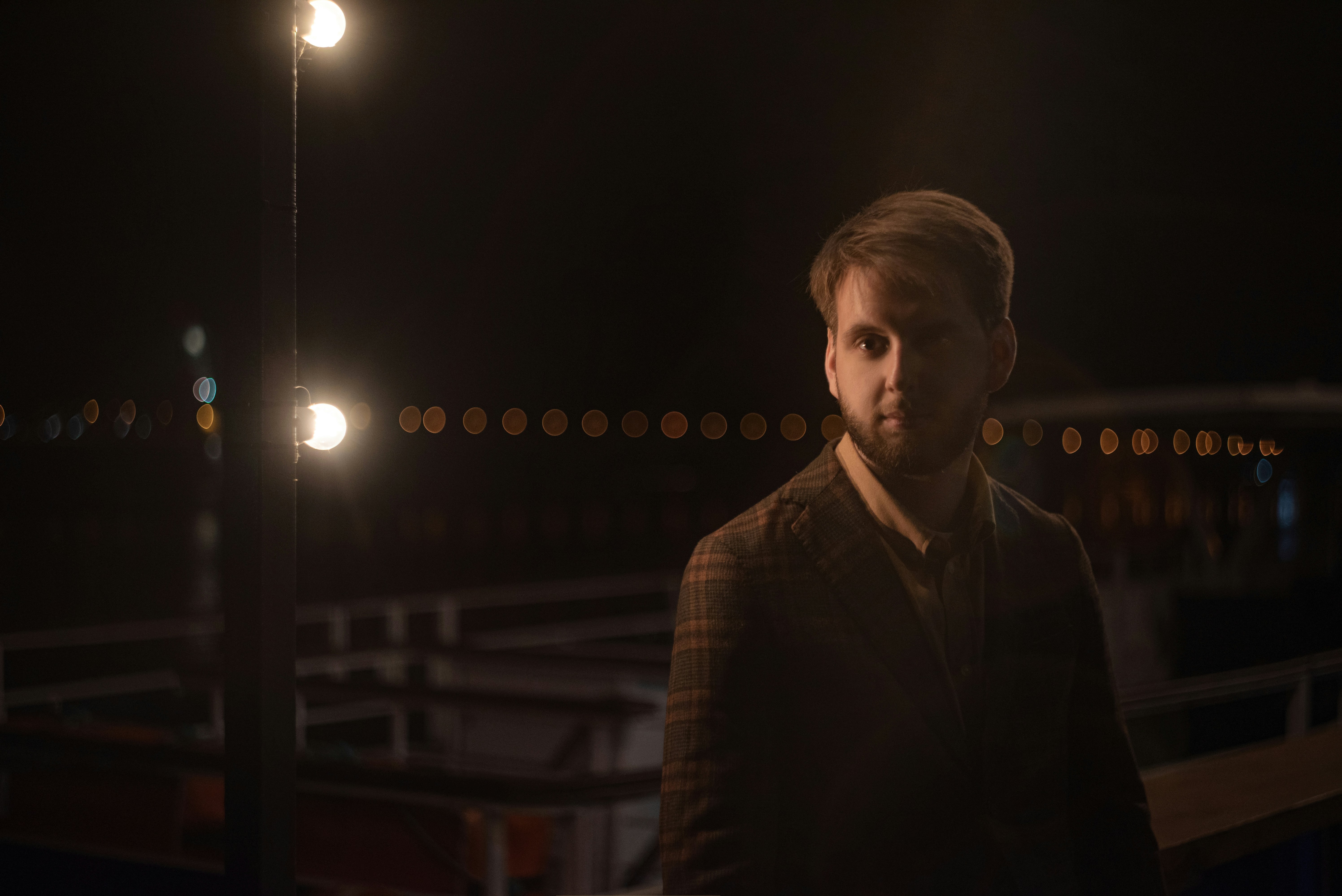 man in black suit jacket